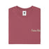 Folded maroon t-shirt with 'Precious Hollows' text on a white background