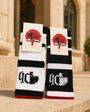 Precious Hollows Heritage Script Crew Socks on a stone ledge
