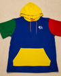 Mini Block Hoodie laid flat on textured fabric
