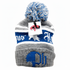 Gray beanie with blue and white pom-pom and branding on a white background