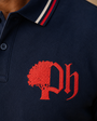 Club Tipped Polo collar and embroidered crest detail
