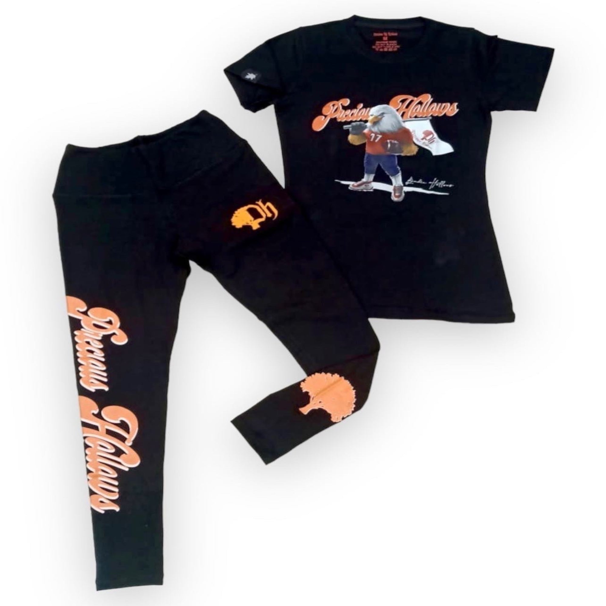 A black t-shirt and matching leggings set with text and graphics design, including a 2-inch embroidered logo and a printed brand name.#color_black