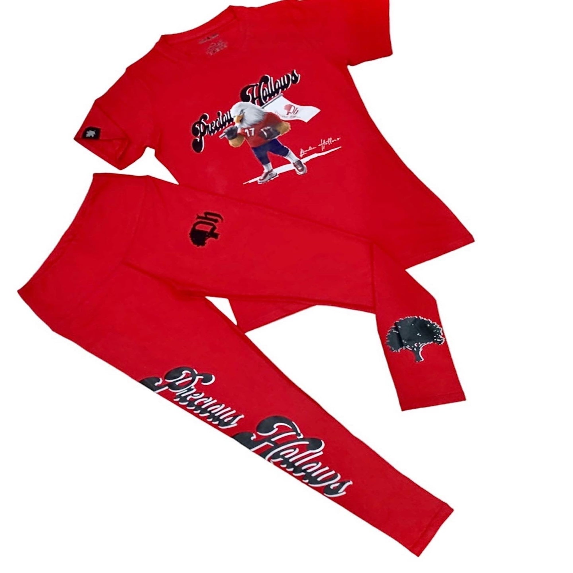 A red t-shirt and matching leggings set with text and graphics design, including a 2-inch embroidered logo and a printed brand name.#color_red