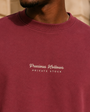 Close view of Precious Hollows embroidery on the Private Stock Crewneck