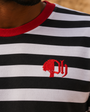 District Stripe Tee with black-and-white stripes and a red collar