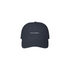 Navy cap with white text on a white background