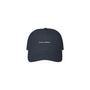 Navy cap with white text on a white background