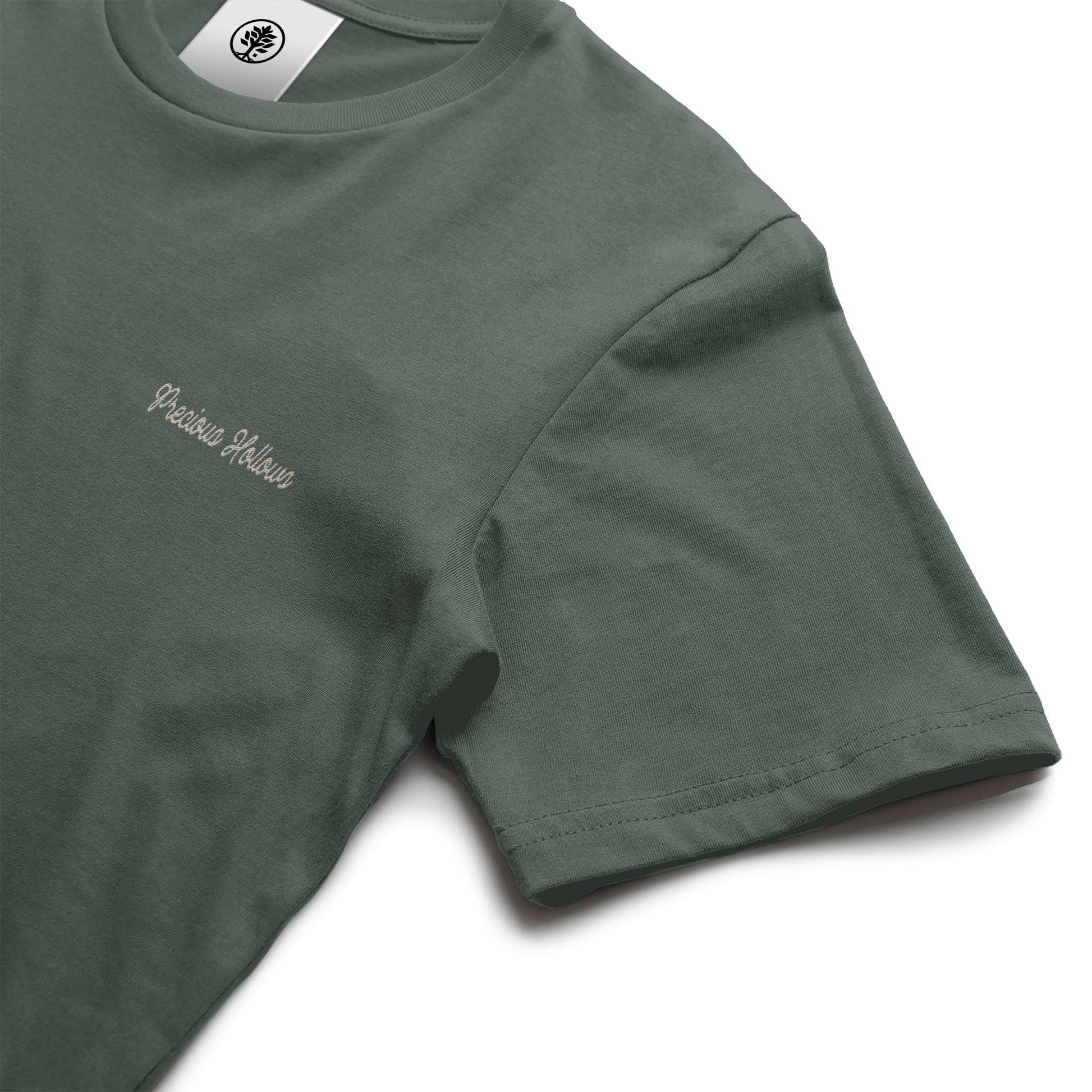 Green t-shirt with a brand logo on a white background