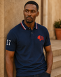 Model wearing the navy Club Tipped Polo outdoors
